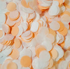 peach and white paper confetti circles 